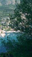 A view of a small town on the coast of a bay video