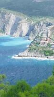 A view of a small town on the coast of a mountain video