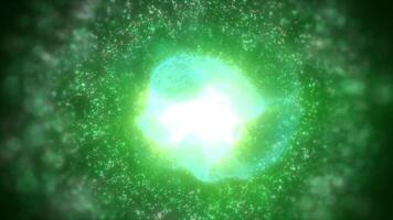 A glowing green nebula sphere with a white core, surrounded by sparkling particles, creating a sense of cosmic energy and mystery background video