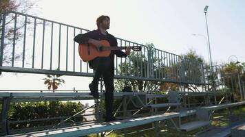 Player Delights In Chords With The Guitar And Stands Before Concert video
