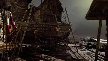 Dockside view of an abandoned fishing vessel under a moody sky video