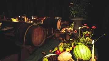 A warm gathering with an assortment of food and drinks on a rustic table video