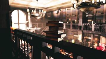 Old library showcases charm and history with stacked books on a railing video