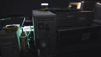 Close up view of vintage computer equipment in a dimly lit workspace video