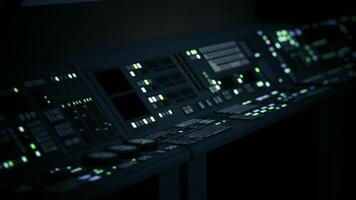 Advanced control panels in a futuristic sci fi laboratory during a night shift video