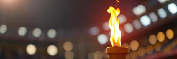 Torch burns brightly in a stadium during an evening ceremony celebrating unity and hope photo