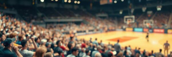 Excited fans cheer at a basketball game in a packed arena during the championship season photo
