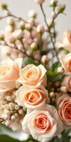 Soft peach roses arranged beautifully in a floral display with delicate buds and greenery for a fresh and elegant look photo