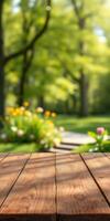 Natural garden setting with a wooden table in the foreground, showcasing vibrant flowers and lush greenery photo