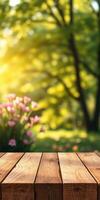 Sunlit wooden table in a garden surrounded by colorful flowers and soft greenery during a warm afternoon photo