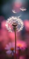Dandelion seeds drifting in the breeze among colorful flowers in a serene garden setting photo