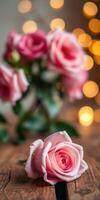 Beautiful bouquet of pink roses with soft bokeh lights creating a warm ambiance during a cozy evening setting photo