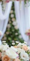 Elegant floral arrangement at a wedding ceremony in a garden during spring season photo