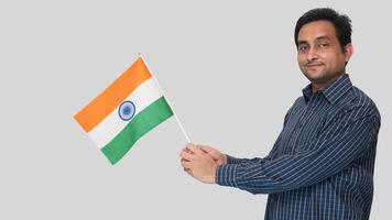 Republic Day of India, a student waved the national flag in hands with feeling. photo
