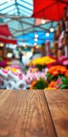 Colorful market filled with vibrant flowers and decorative items attracts visitors during bright daylight photo