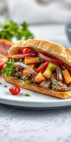 Flavorful sandwich with grilled meat, fresh vegetables, and juicy toppings served on a plate photo