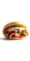 Delicious fried chicken sandwich with fresh vegetables and creamy sauce on a soft bun ready to enjoy photo
