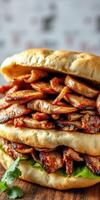 Deliciously stacked sandwich filled with grilled meat and fresh greens at a casual dining location photo