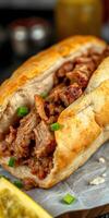 Delicious pulled pork sandwich garnished with green onions and served on fresh artisan bread photo
