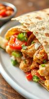 Delicious chicken fajitas wrapped in warm tortillas presented on a plate with fresh toppings photo