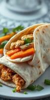 Delicious wrap filled with spiced chicken and fresh vegetables served on a plate photo