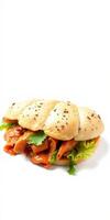 Delicious sandwich featuring tender chicken and fresh lettuce in a soft roll served on white background photo