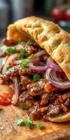 Delicious street food featuring tender meat and fresh vegetables in a toasted bun photo
