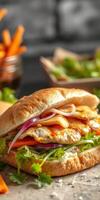 Delicious grilled chicken sandwich served with fresh vegetables and crispy fries on a rustic table photo