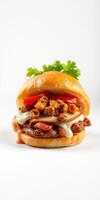 Gourmet burger with melted cheese, fried onions, and fresh vegetables on a soft bun photo