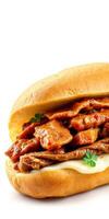 Savory sandwich with grilled meat and sauce served in a soft bun, perfect for a quick lunch or snack photo
