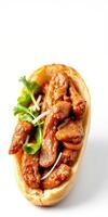 Delicious savory dish featuring succulent meat and fresh herbs in a soft bread photo