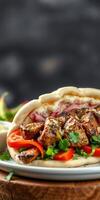 Grilled meat wrap with fresh vegetables and herbs served on a wooden platter in a cozy setting photo