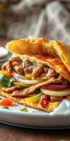 Delicious chicken fajitas served in a flaky pastry with colorful vegetables on a rustic wooden table photo
