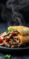 Savory grilled meat wrapped in a warm flatbread served with herbs and tomatoes photo