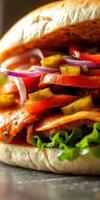 Juicy grilled chicken sandwich loaded with fresh vegetables and toppings ready to be enjoyed photo