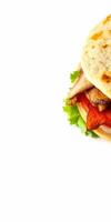 Delicious grilled chicken sandwich with fresh vegetables and flatbread on a white background photo