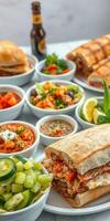 Delicious assortment of Mexican food featuring tacos, quesadillas, and fresh ingredients at a casual dining setting photo