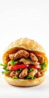 Juicy chicken sandwich layered with fresh vegetables and creamy sauce ready to be enjoyed photo