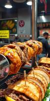 Delicious street food vendor serving flavorful meat sandwiches at a bustling market in the evening photo