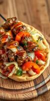 Delicious kebab served on flatbread with fresh vegetables and savory sauce in a rustic setting photo