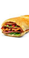 Freshly made sandwich with layers of bacon, lettuce, tomato, and herbs served on a toasted roll photo