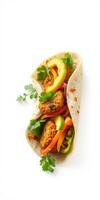 Fresh vegetable and falafel wrap served with herbs on a white background perfect for healthy eating photo