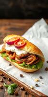 Delicious sandwich filled with grilled meat, fresh vegetables, and creamy sauce on a wooden table photo