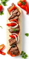 Delicious beef wrap filled with fresh vegetables and herbs on a white background photo