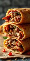 Delicious wraps filled with savory meat and fresh vegetables stacked on a rustic background photo