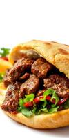 Delicious beef sandwich with fresh vegetables and savory sauce on a warm bun photo