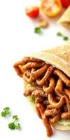 Delicious wrap filled with savory strips of meat and fresh ingredients ready to be enjoyed photo