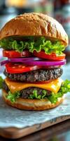 Juicy stacked burger with fresh vegetables, cheese, and lettuce prepared in a diner setting photo
