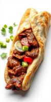 Savory grilled meat wrapped in soft bread with fresh vegetables served on a white background photo