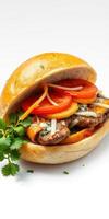 Tasty sandwich filled with grilled meat, fresh vegetables, and flavorful sauces on a soft bun photo